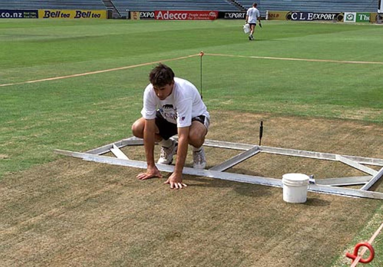 Stephen Fleming inspects the removable pitch to be used for the first time at Eden Park, New Zealand v Pakistan, 1st Test, Auckland, March 8, 2001