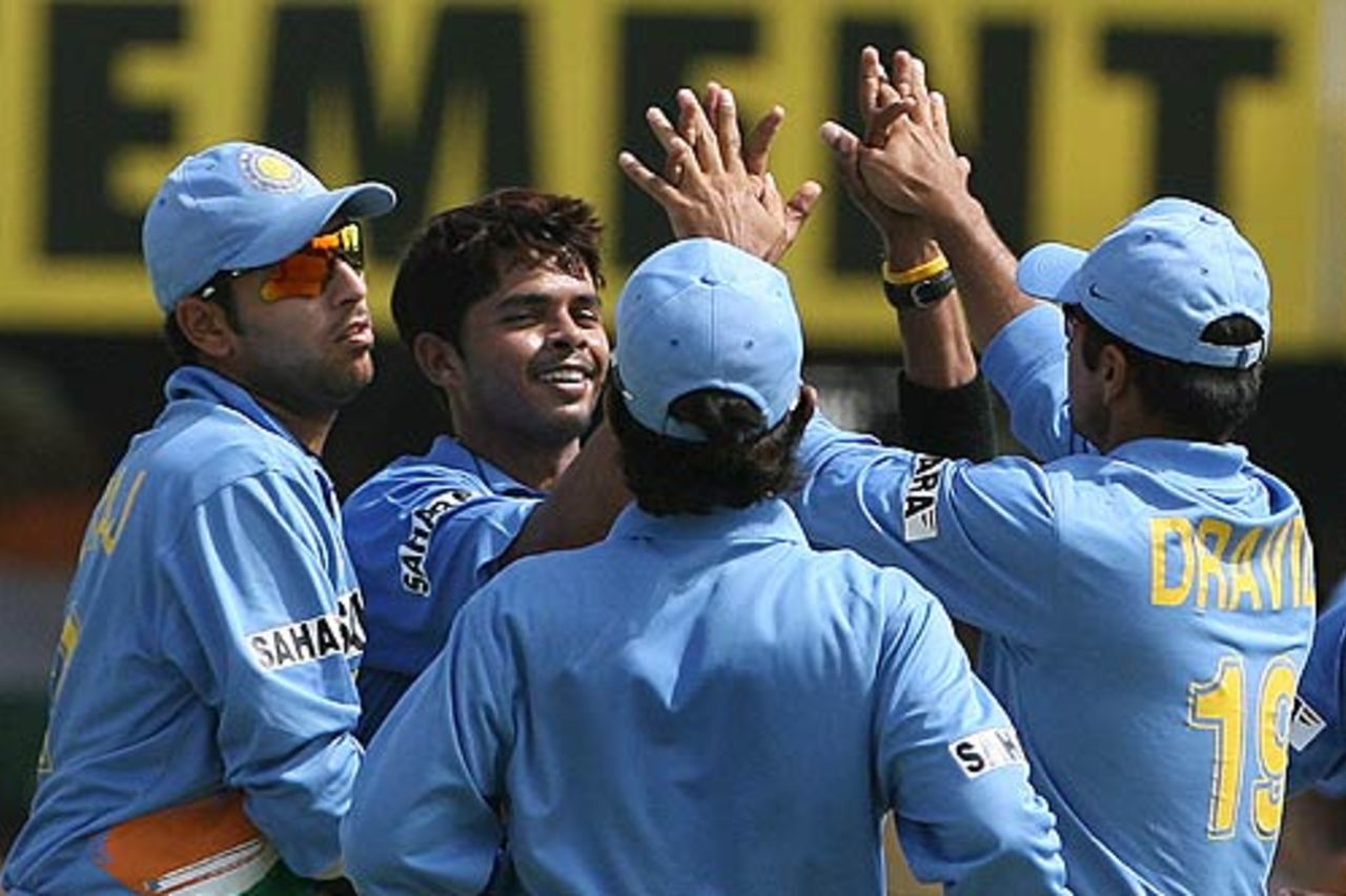 Sreesanth celebrates with the rest as England lose a flurry of wickets, India v England, 7th ODI, Indore, April 15 2006