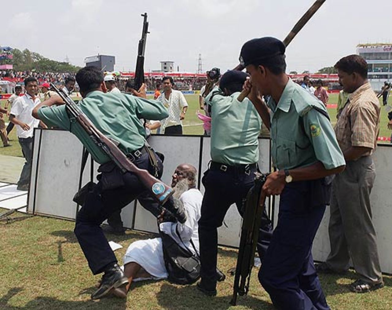 Bangladeshi policemen beat a 65-year-old photographer during a media protest, Bangladesh v Australia, 2nd Test, Chittagong, 1st day, April 16, 2006