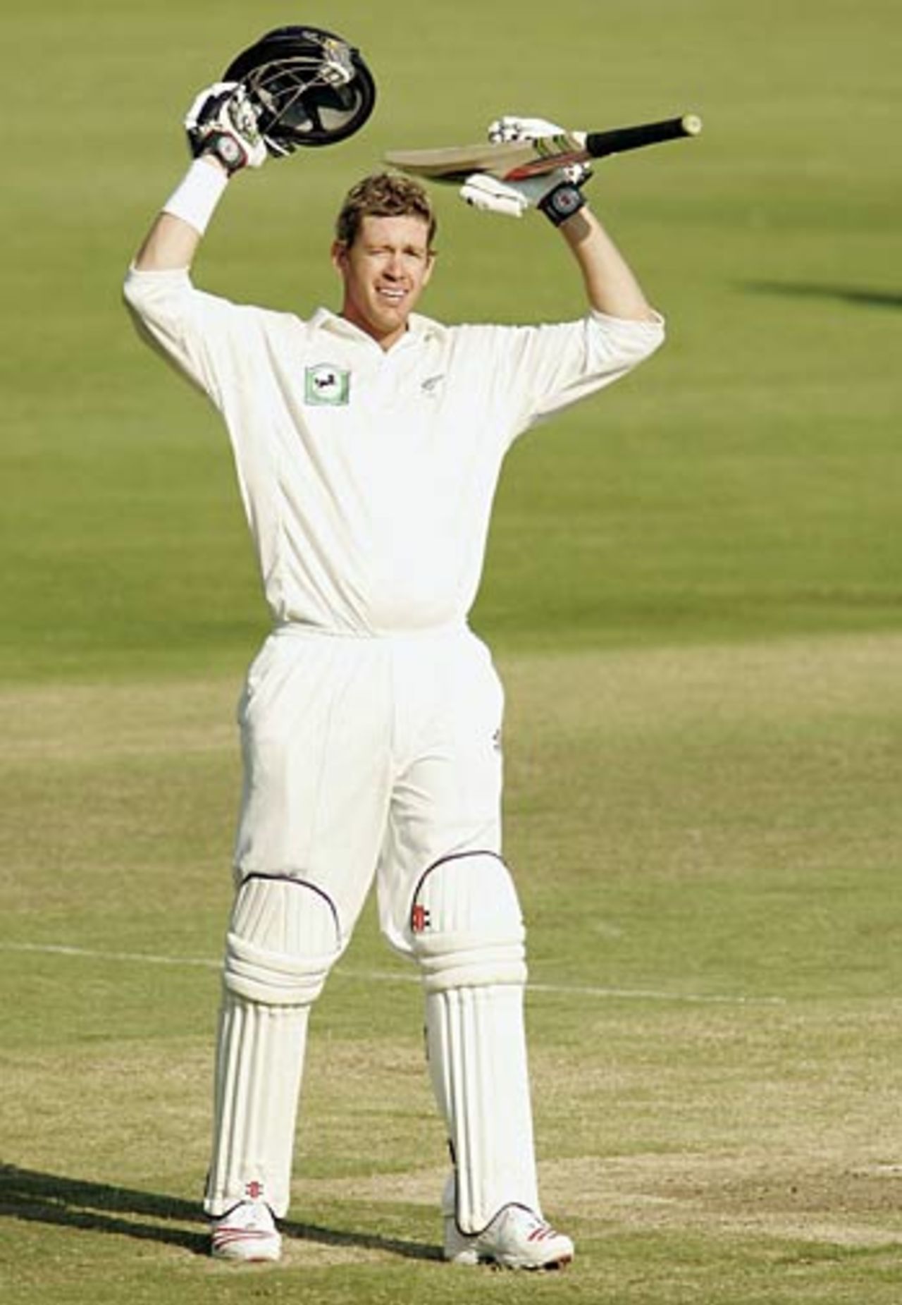 Arms aloft: Jacob Oram salutes the dressing room on reaching his third Test century, South Africa v New Zealand, 1st Test, Centurion Park, April 16, 2006
