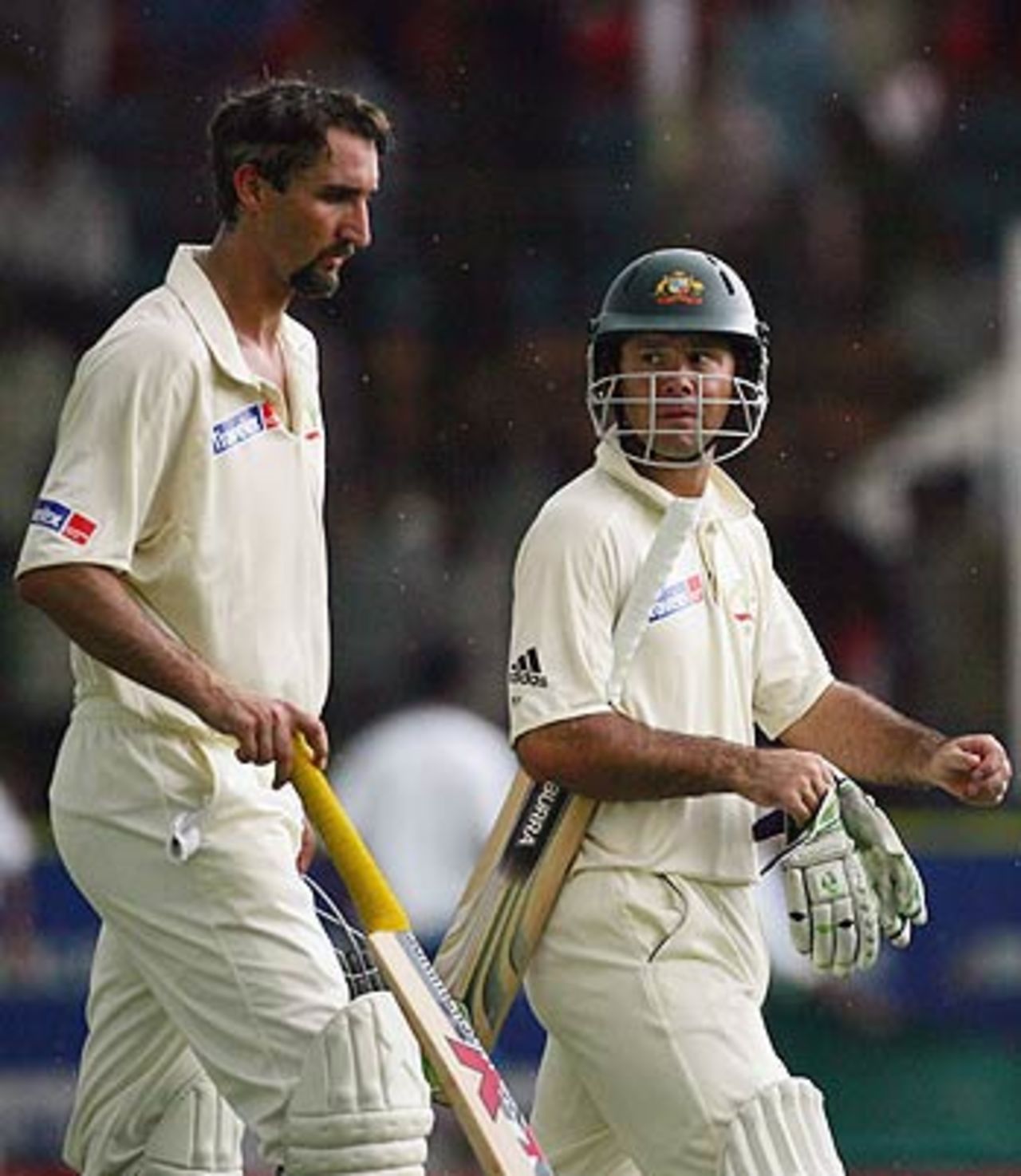 Jason Gillespie and Ricky Ponting leave as the storm arrives, Bangladesh v Australia, 2nd Test, Chittagong, 2nd day, April 17, 2006