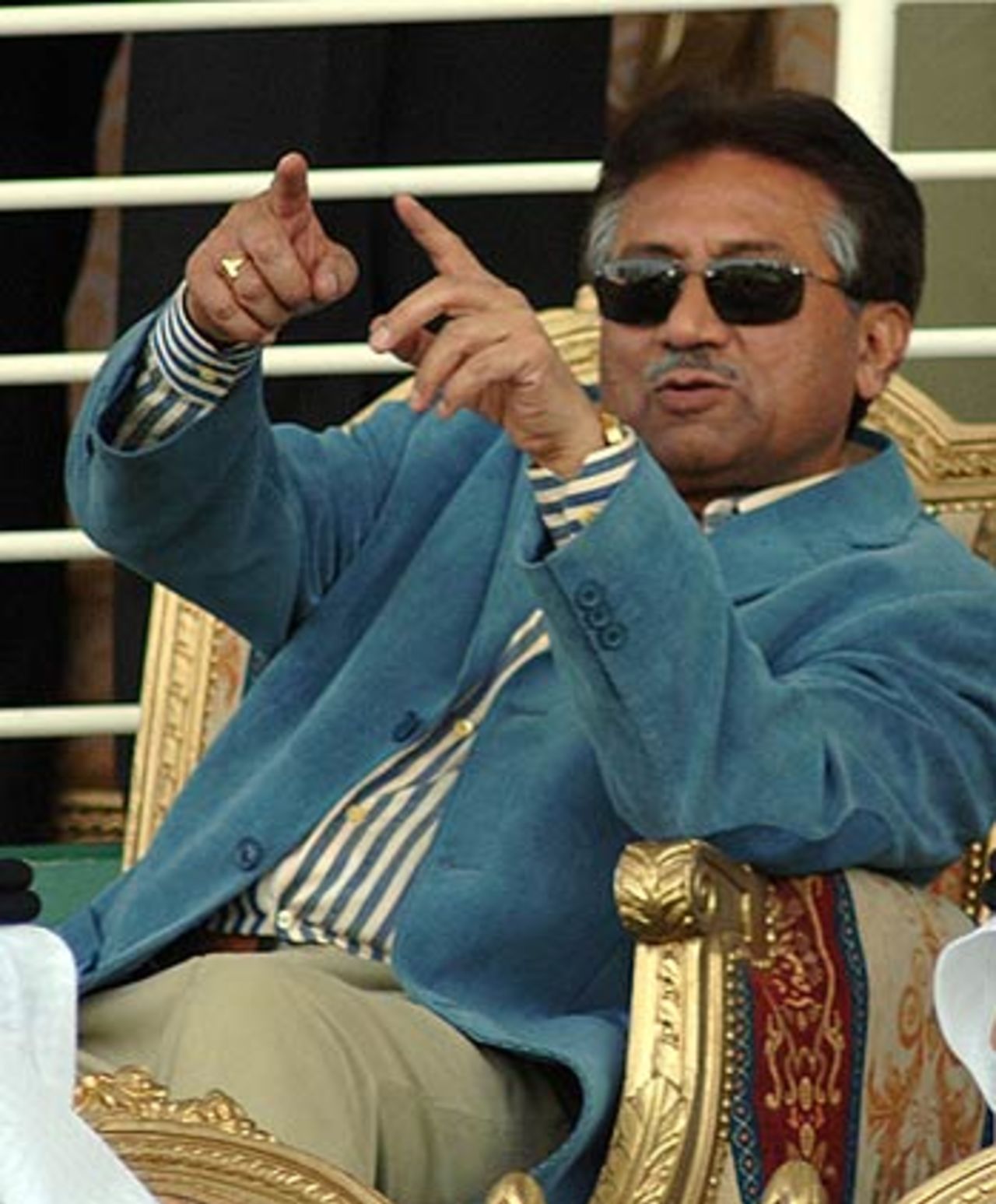 Pervez Musharraf waves to the crowd during the first game, India v Pakistan, DLF Cup, Zayad Cricket Stadium, Abu Dhabi, April 18, 2006