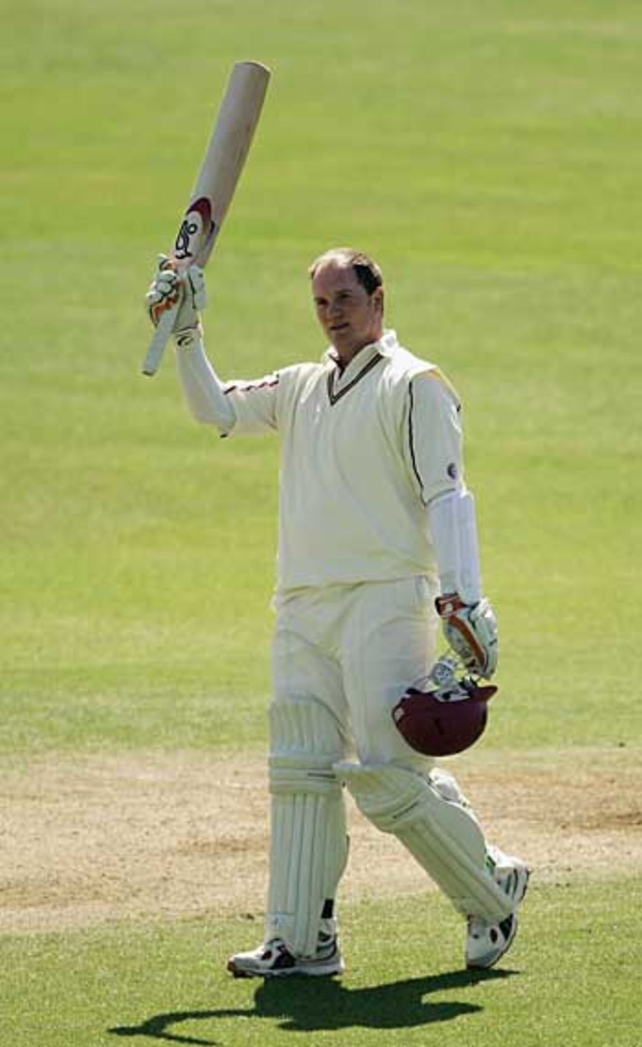 David Sales raises his bat on reaching his hundred, Essex v Northamptonshire, Chelmsford, April 22, 2006