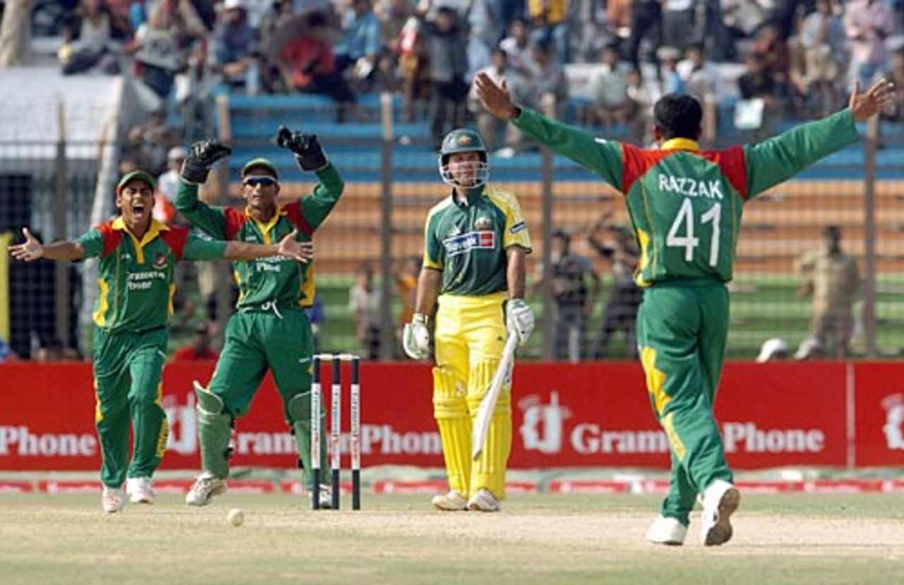 Ricky Ponting looks on as  Abdur Razzak celebrates with his teammates, Bangladesh v Australia, 1st ODI, Chittagong, April 23, 2006