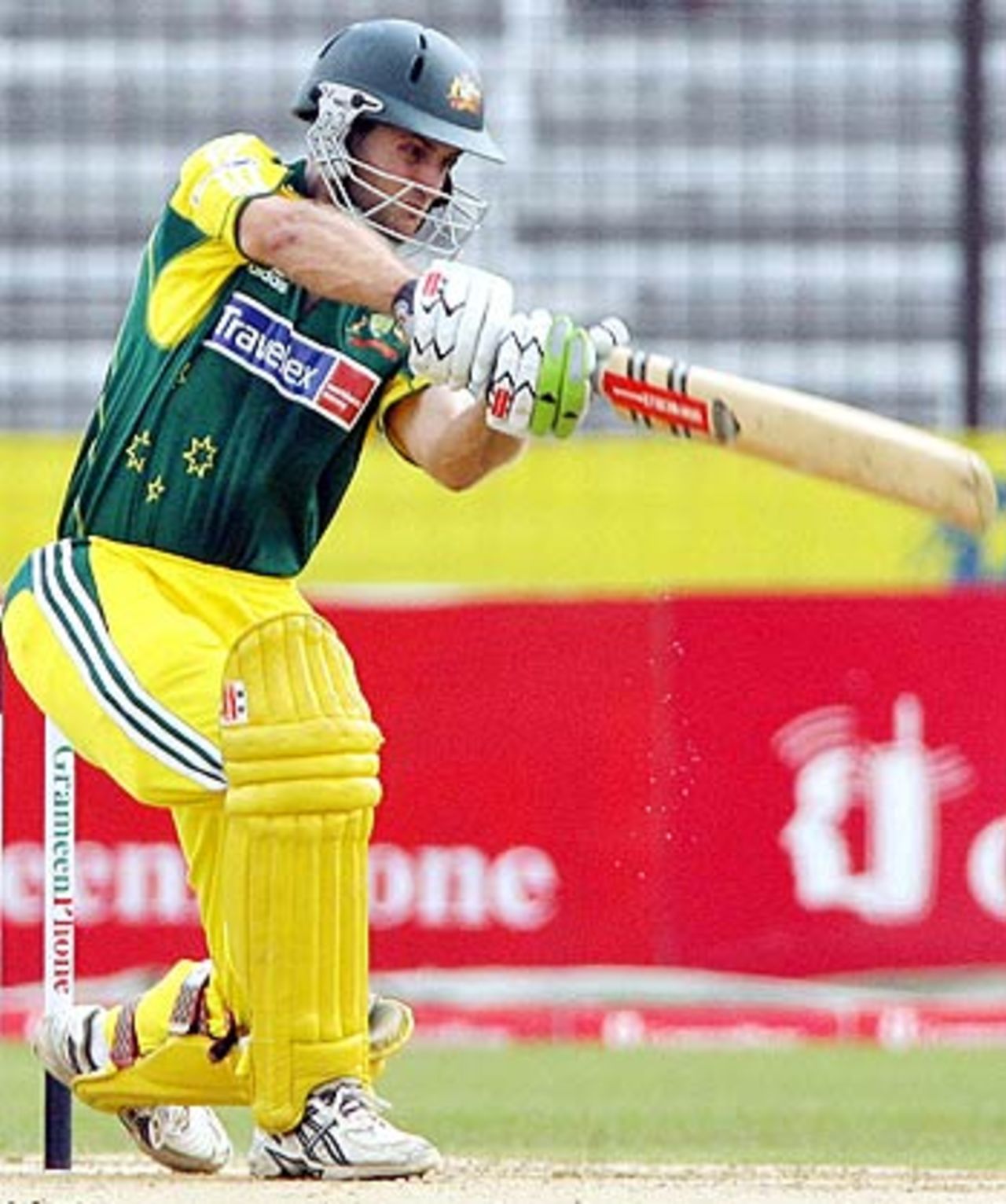 Simon Katich drives through cover during his 26, Bangladesh v Australia, 2nd ODI, Fatullah, April 26, 2006