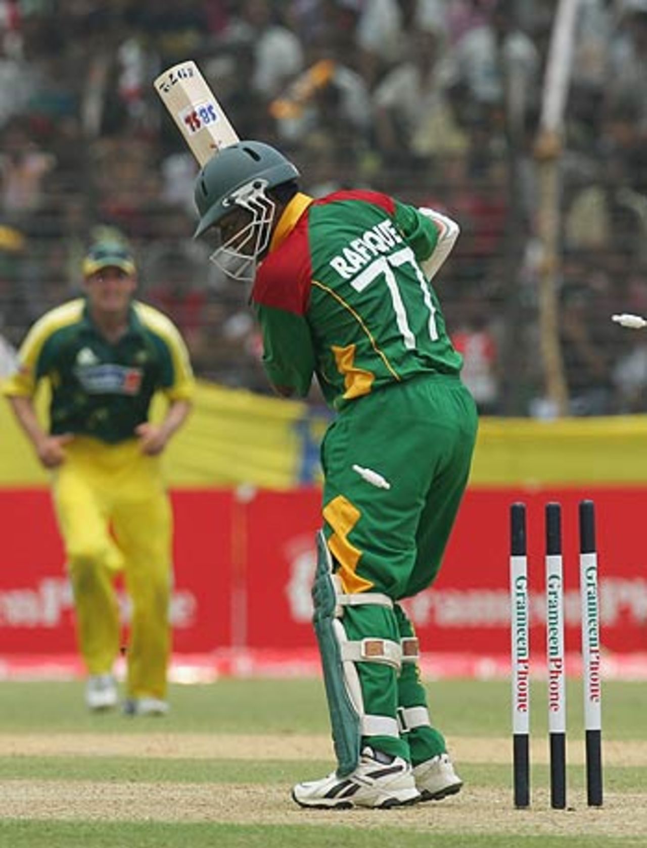 Mohammad Rafique loses his stumps to Mitchell Johnson, Bangladesh v Australia, 3rd ODI, Fatullah, April 28, 2006