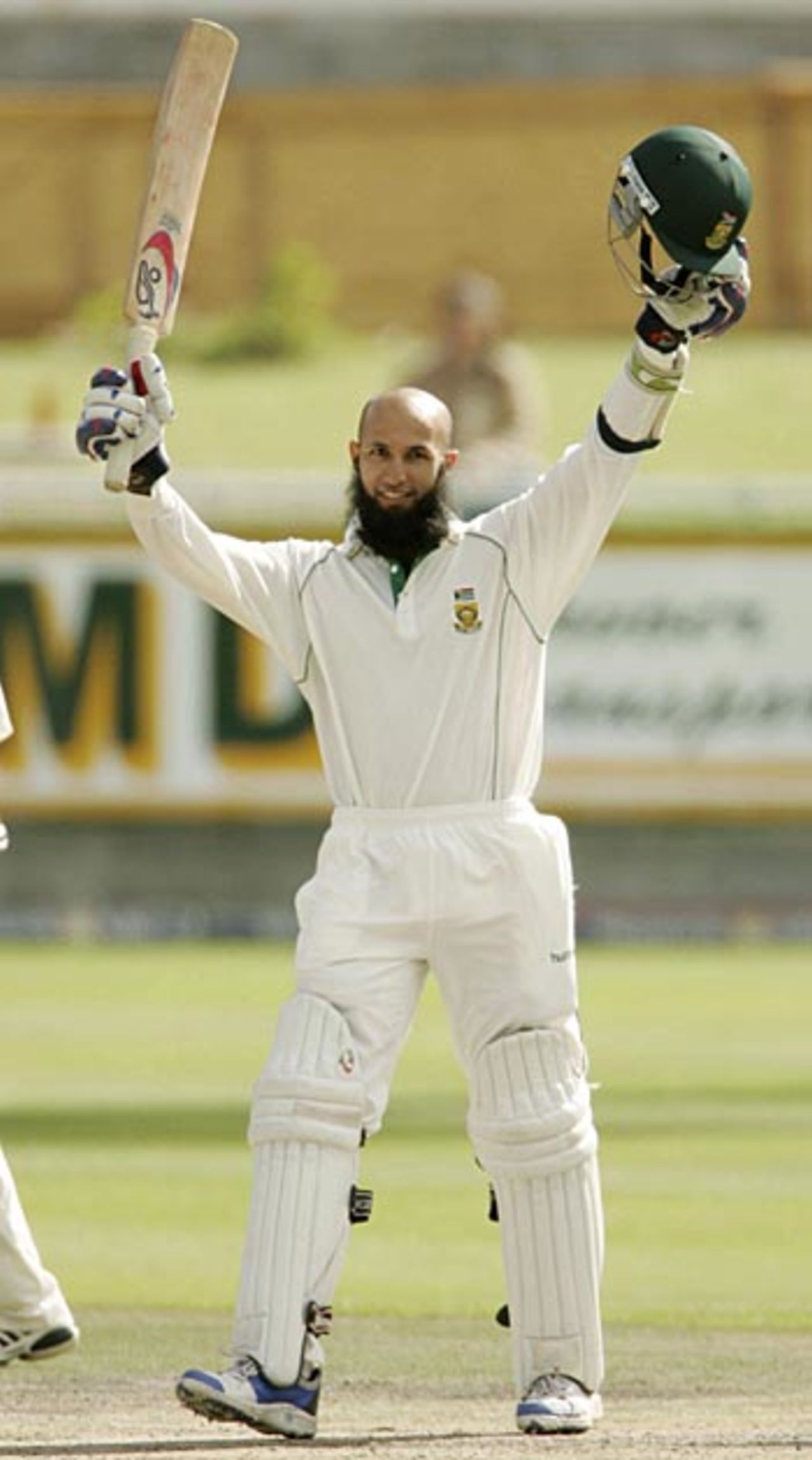 Hashim Amla enjoys his first Test century, reached off 242 balls, on the fourth day at Cape Town, South Africa v New Zealand, 2nd Test, Cape Town, April 30, 2006