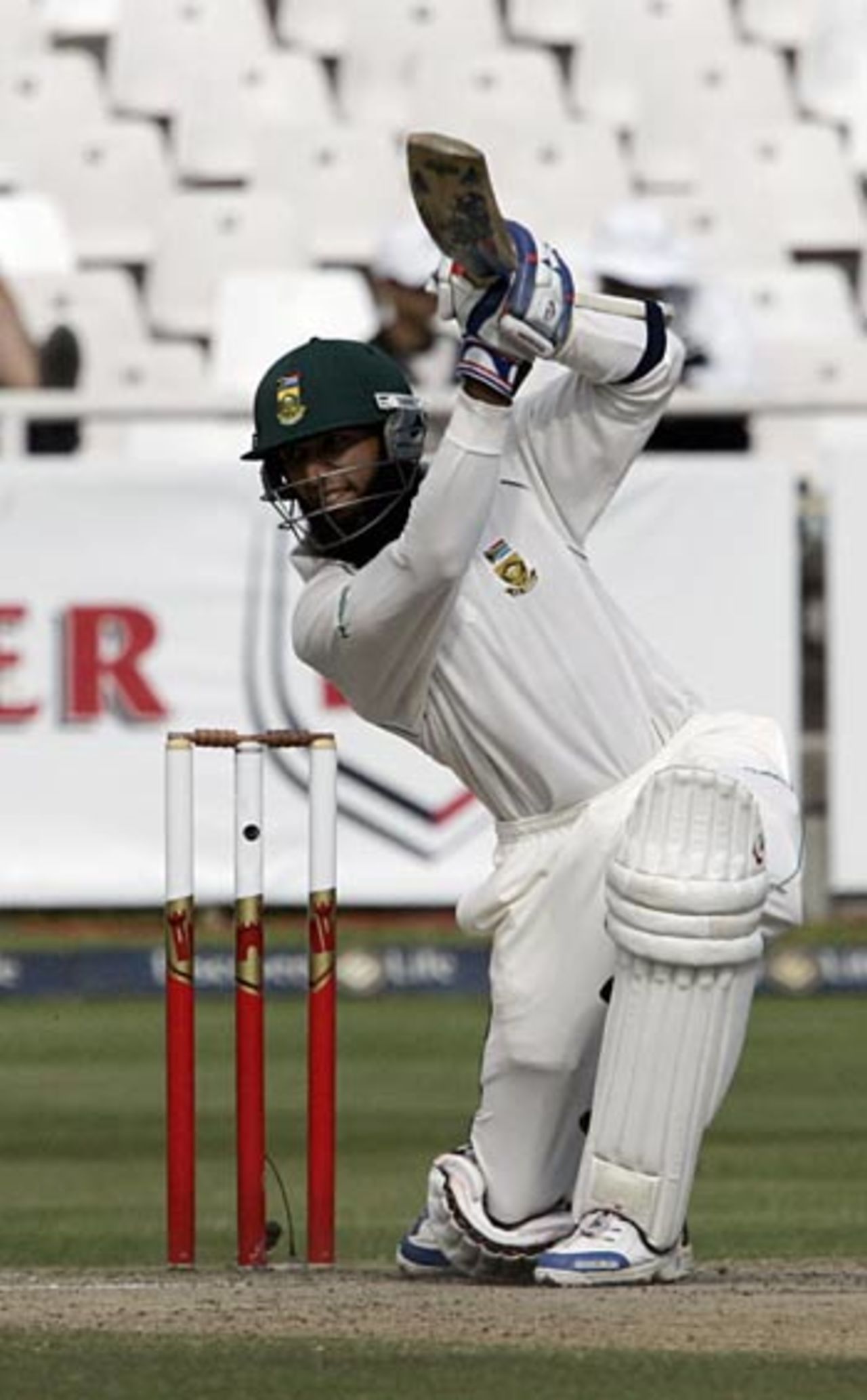 Hashim Amla strikes a cover drive during his first Test century, South Africa v New Zealand, 2nd Test, Cape Town, April 30, 2006
