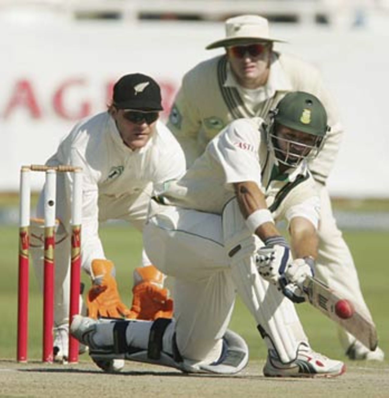 Ashwell Prince sweeps as he guides South Africa past the follow-on and towards a draw, South Africa v New Zealand, 2nd Test, Cape Town, April 30, 2006