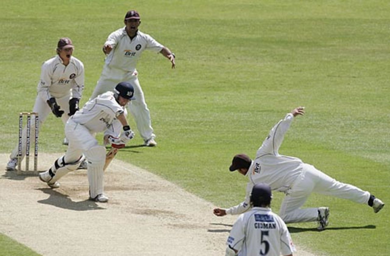 Mark Butcher dives to dismiss Phil Weston, Surrey v Gloucestershire, The Oval, May 5, 2006