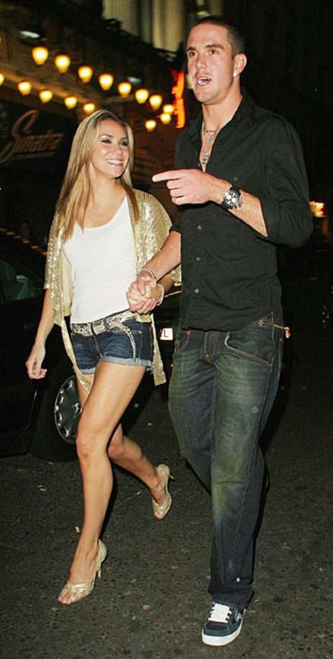 Kevin Pieterson and Jessica Taylor leave a London nightclub, April 30, 2006