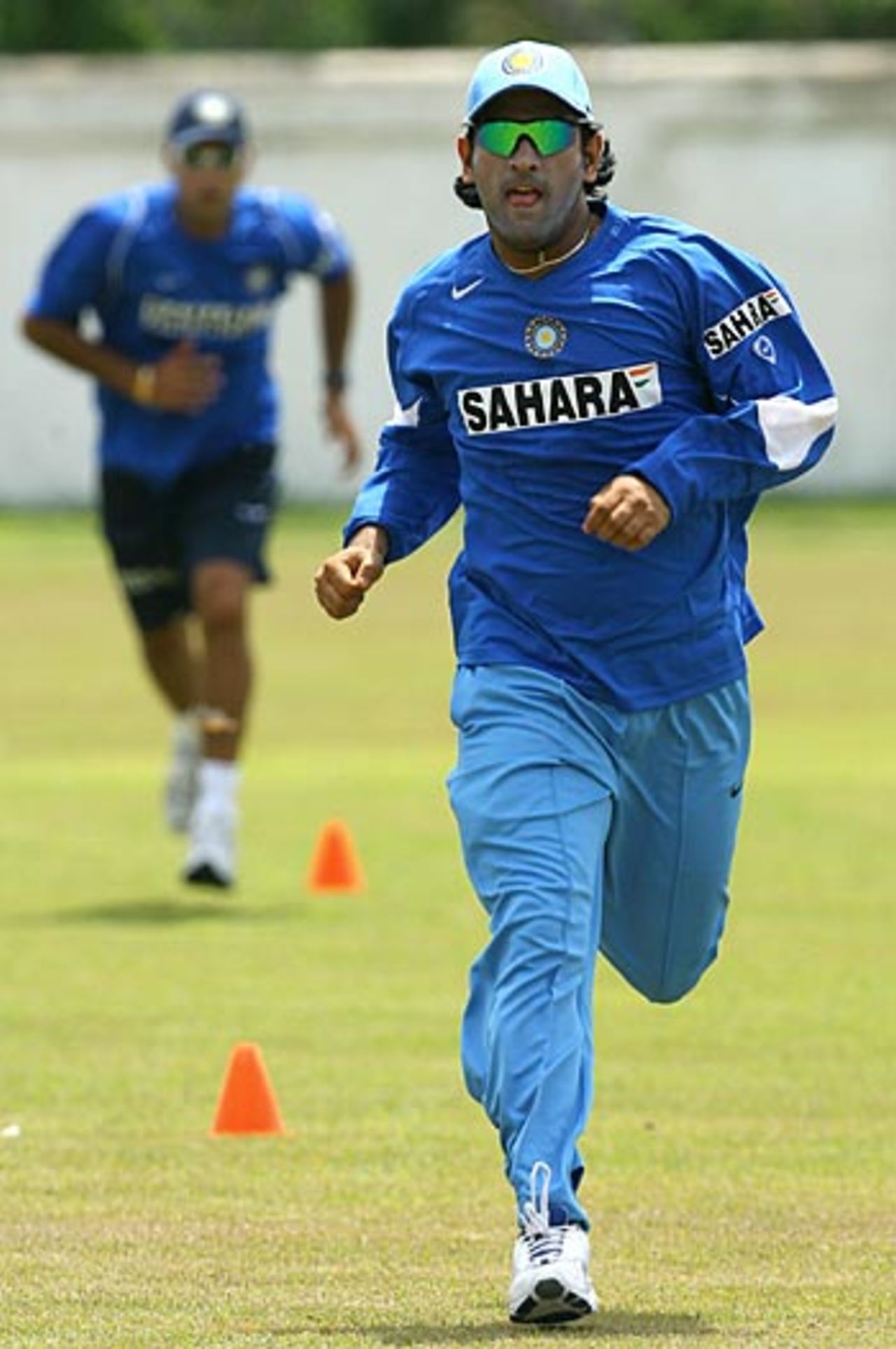 Mahendra Singh Dhoni gets in some sprint training during the Indian team's first full practice since landing in the Caribbeans in Spanish Town, some 30 kilometres west of Kingston, May 14, 2006