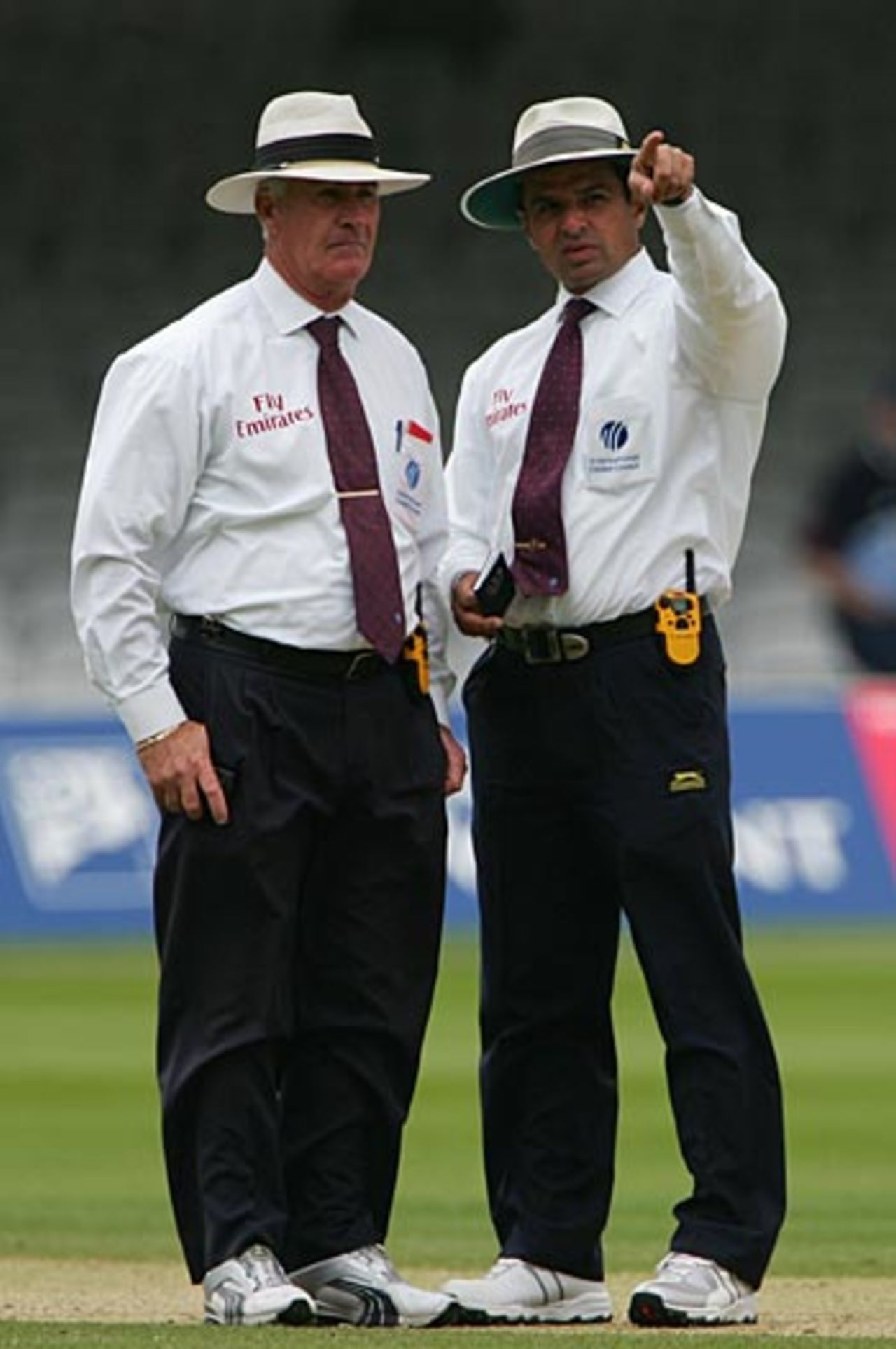 Prophets of gloom: Umpires Rudi Koertzen and Aleem Dar discuss the fading light, England v Sri Lanka, 1st Test, Lord's, May 15, 2006