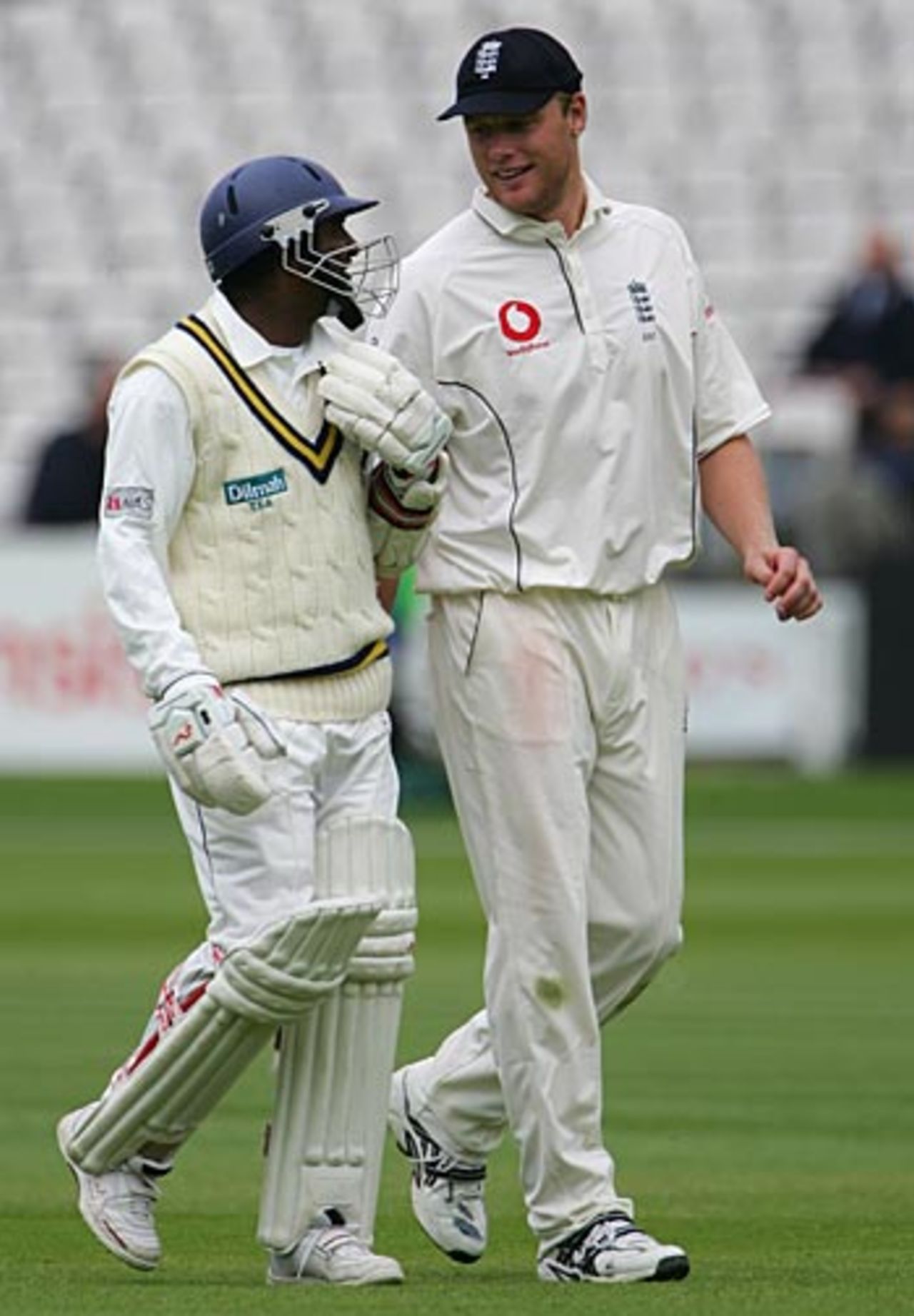 Andrew Flintoff and Muttiah Muralitharan chat after bad light forced players off, England v Sri Lanka, 1st Test, Lord's, May 15, 2006