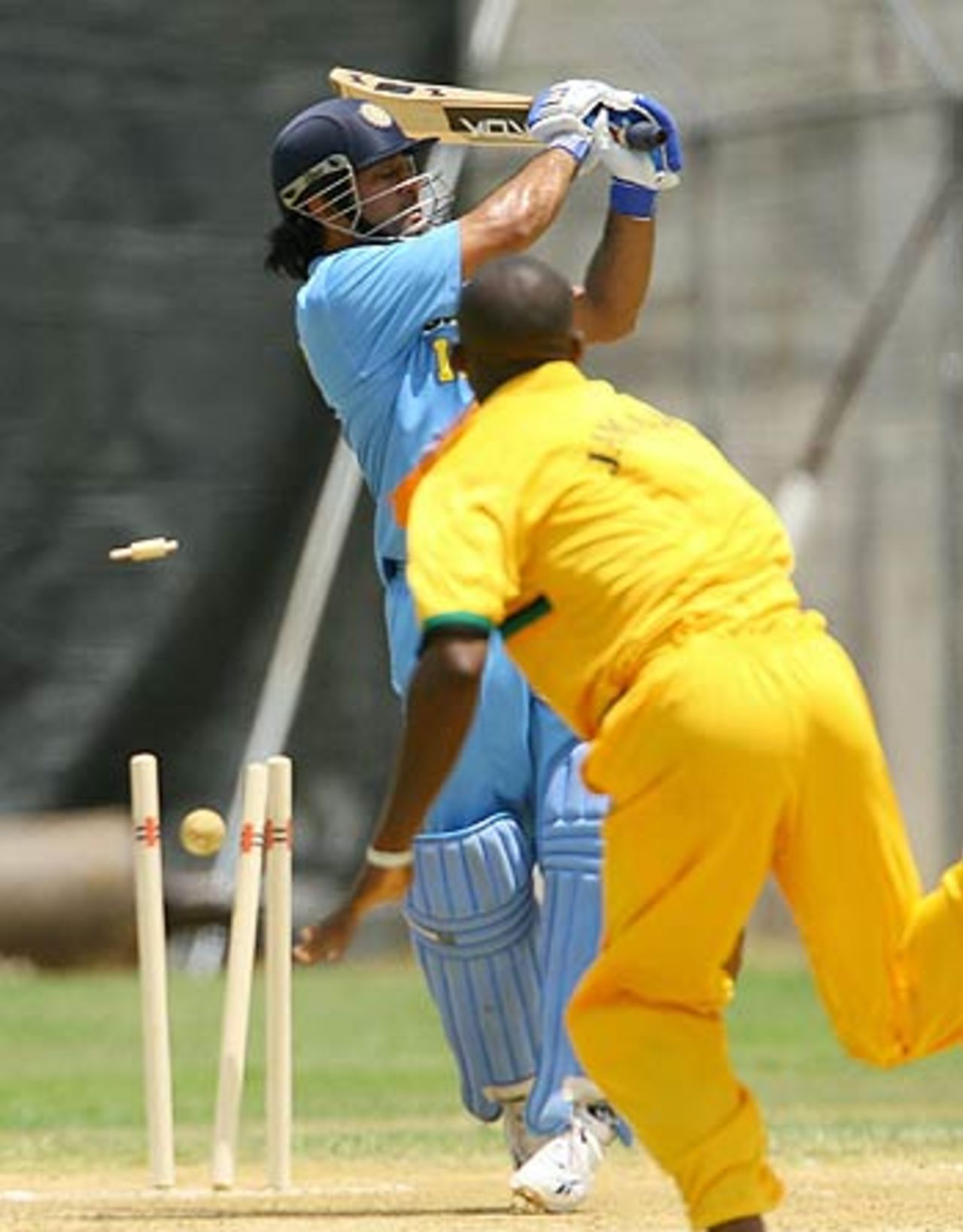 Mahendra Singh Dhoni is cleaned up for a 23-ball 45 against Jamaica, Jamaica v Indians, Montego Bay, May 16, 2006