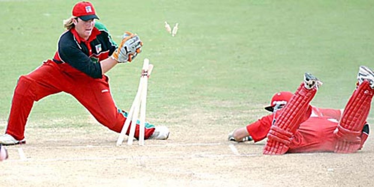 Brendan Taylor completes one of three run-outs, Canada v Zimbabwe, Tri-Nation ODI, Trinidad, May 16, 2006