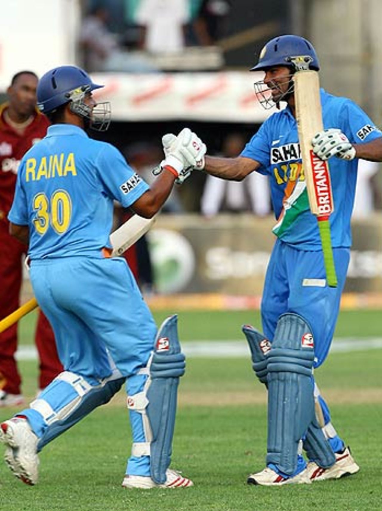 The UP duo of Suresh Raina and Mohammad Kaif celebrate a thriller at Kingston, West Indies v India, 1st ODI, Kingston, May 18, 2006