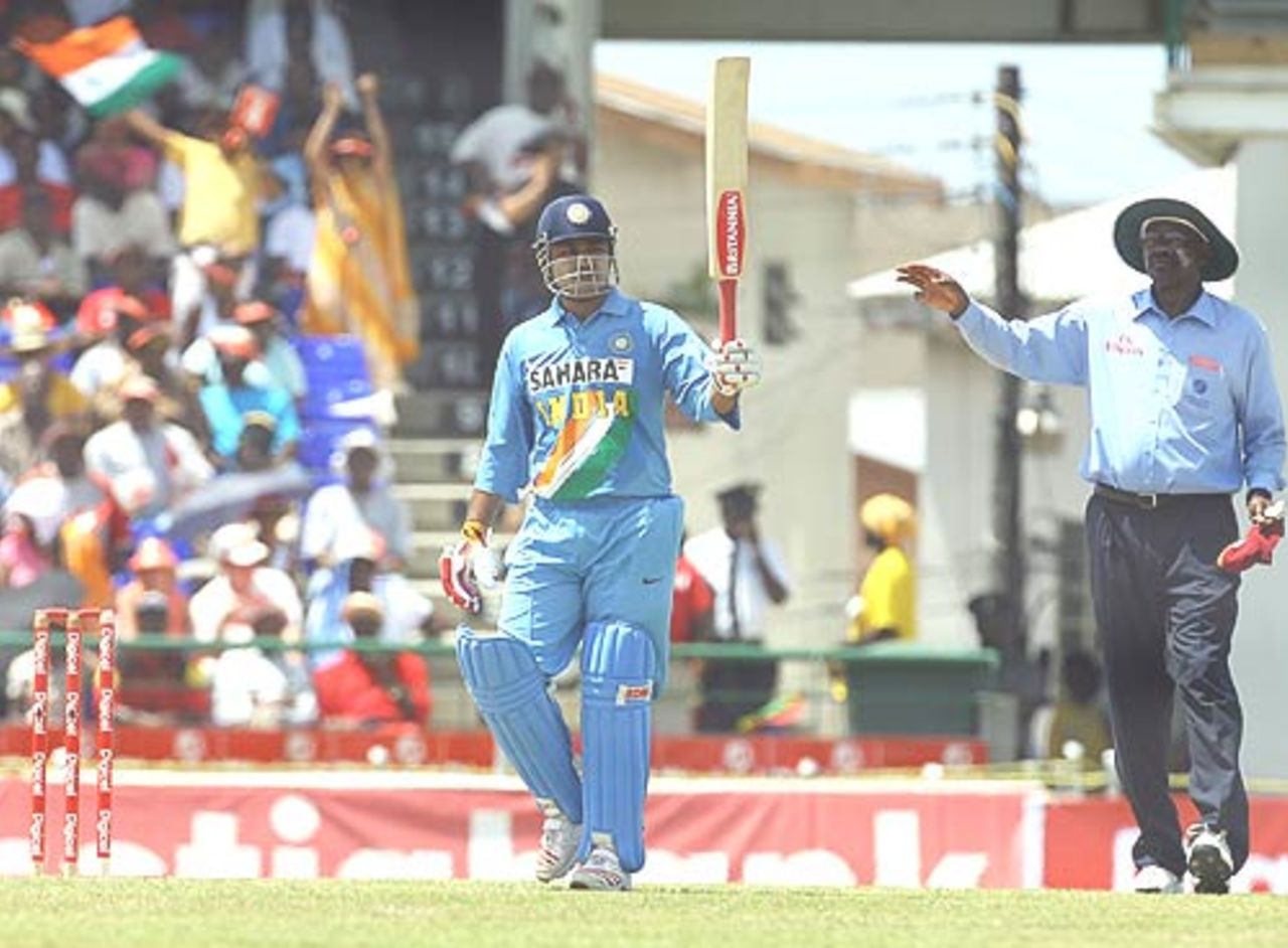 Virender Sehwag celebrates his half-century at the 3rd ODI, West Indies v India, St Kitts, May 23, 2006