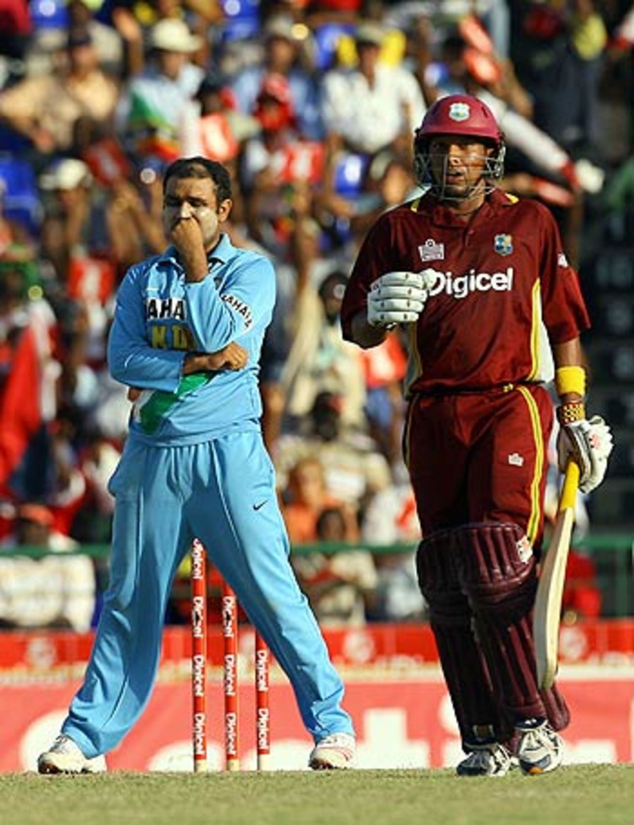 Virender Sehwag looks more than happy to see Ramnaresh Sarwan get a hundred, West Indies v India, 3rd ODI, St Kitts, May 23, 2006