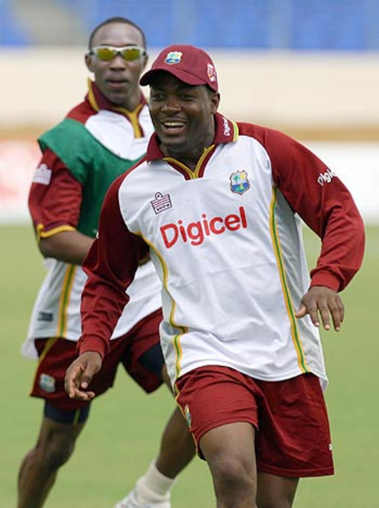 Brian Lara and Dwayne Bravo play soccer during a training session at the Queen's Park Oval, Port-of-Spain, Trinidad, May 25 2006