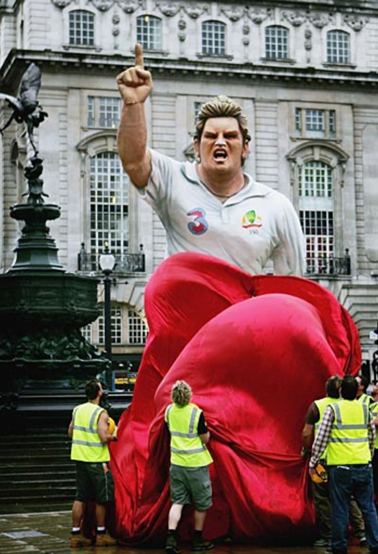 A statue of Shane Warne is unveiled at Piccadilly Circus in London ahead of this winter's Ashes series in Australia