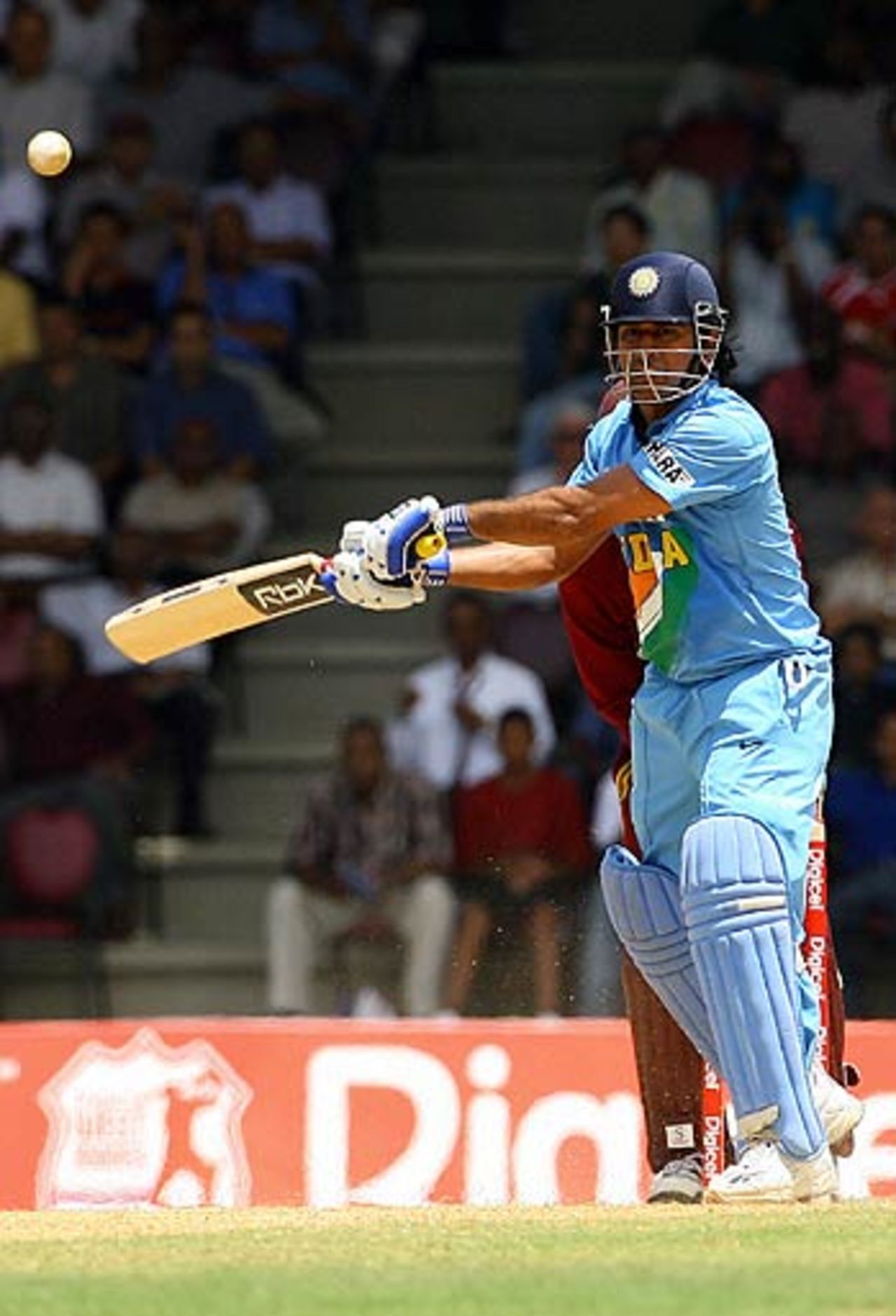 Mahendra Singh Dhoni shapes to hit a boundary, West Indies v India, 4th ODI, Trinidad, May 26, 2006