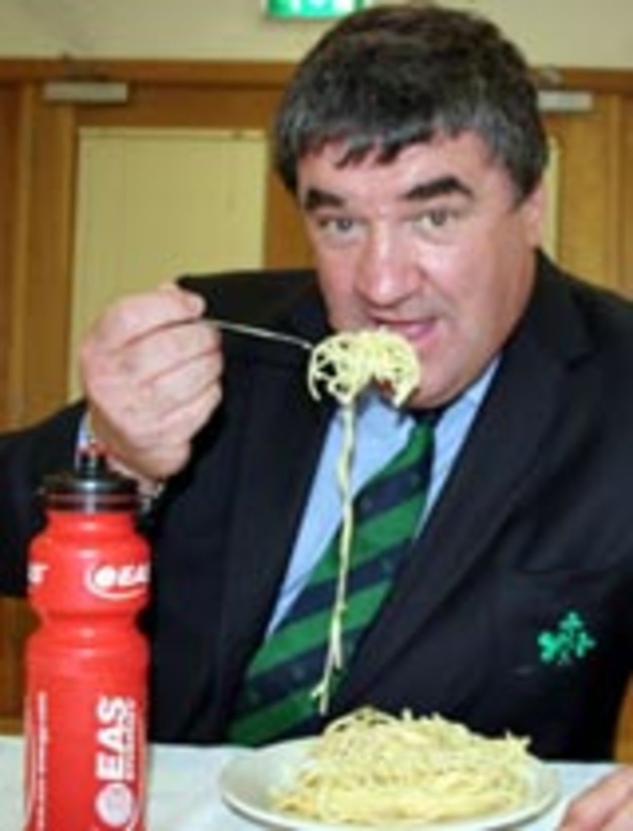 The Ireland manager, Roy Torrens, tucks into some healthy food on the launch of Ireland's fitness drive, May 26, 2006
