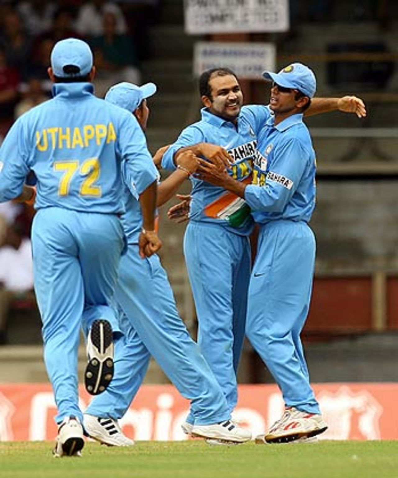 Virender Sehwag is congratulated after bowling Chris Gayle for 51, West Indies v India, 5th ODI, Trinidad, May 28, 2006