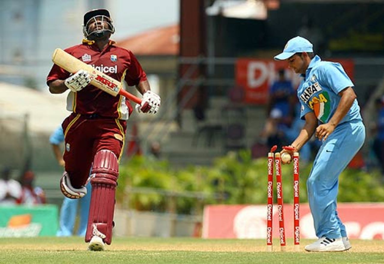 Brian Lara reaches home safely as Suresh Raina tries to run him out, West Indies v India, 5th ODI, Trinidad, May 28, 2006