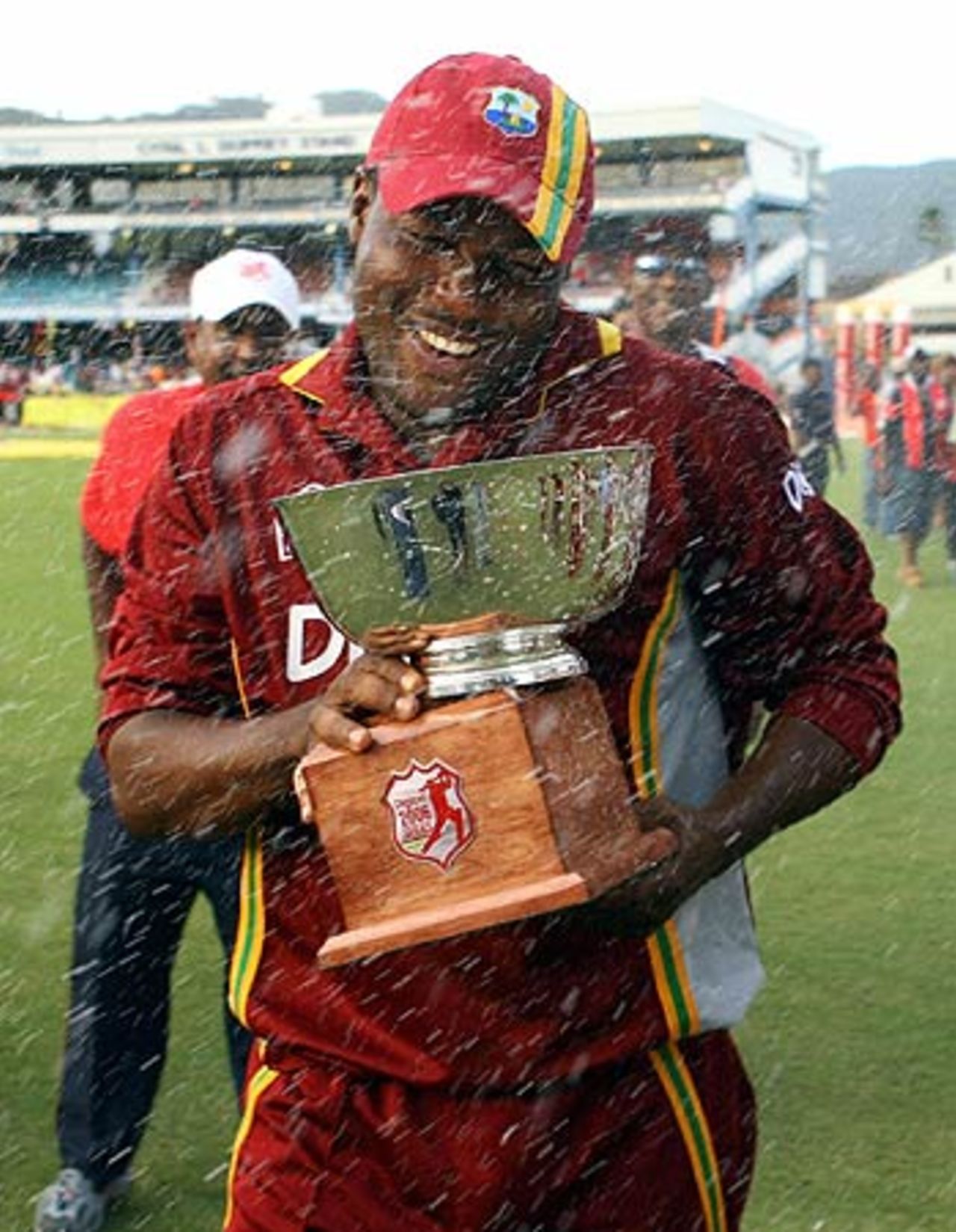 Brian Lara is showered in champagne after the West Indies' series win in Trinidad, West Indies v India, 5th ODI, Trinidad, May 28, 2006