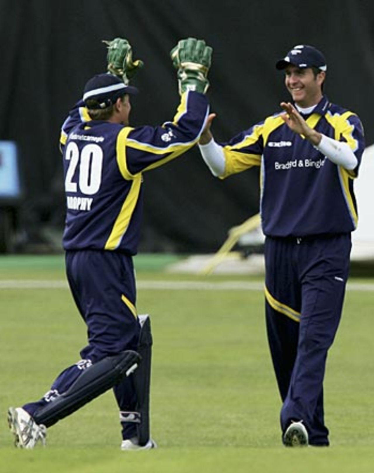 Michael Vaughan, back in the field for Yorkshire, is congratulated on running out Craig Wright, Yorkshire v Scotland, C&G Trophy, Headingley, May 29, 2006