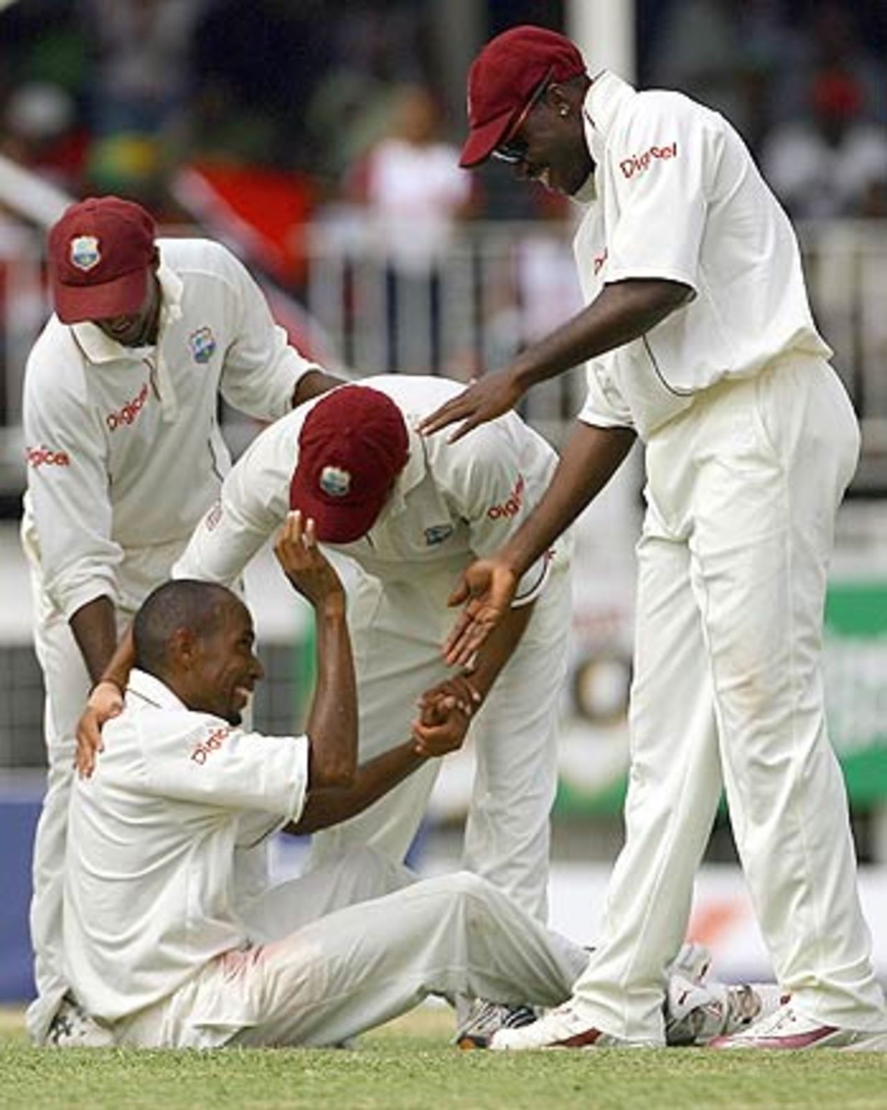 The West Indians congratulate Ian Bradshaw after Wasim Jaffer's wicket, West Indies v India, 1st Test, Antigua, 4th day, June 5, 2006