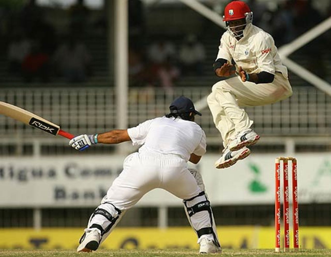 Mahendra Singh Dhoni sends Dwayne Bravo scurrying, West Indies v India, 1st Test, Antigua, 4th day, June 5, 2006