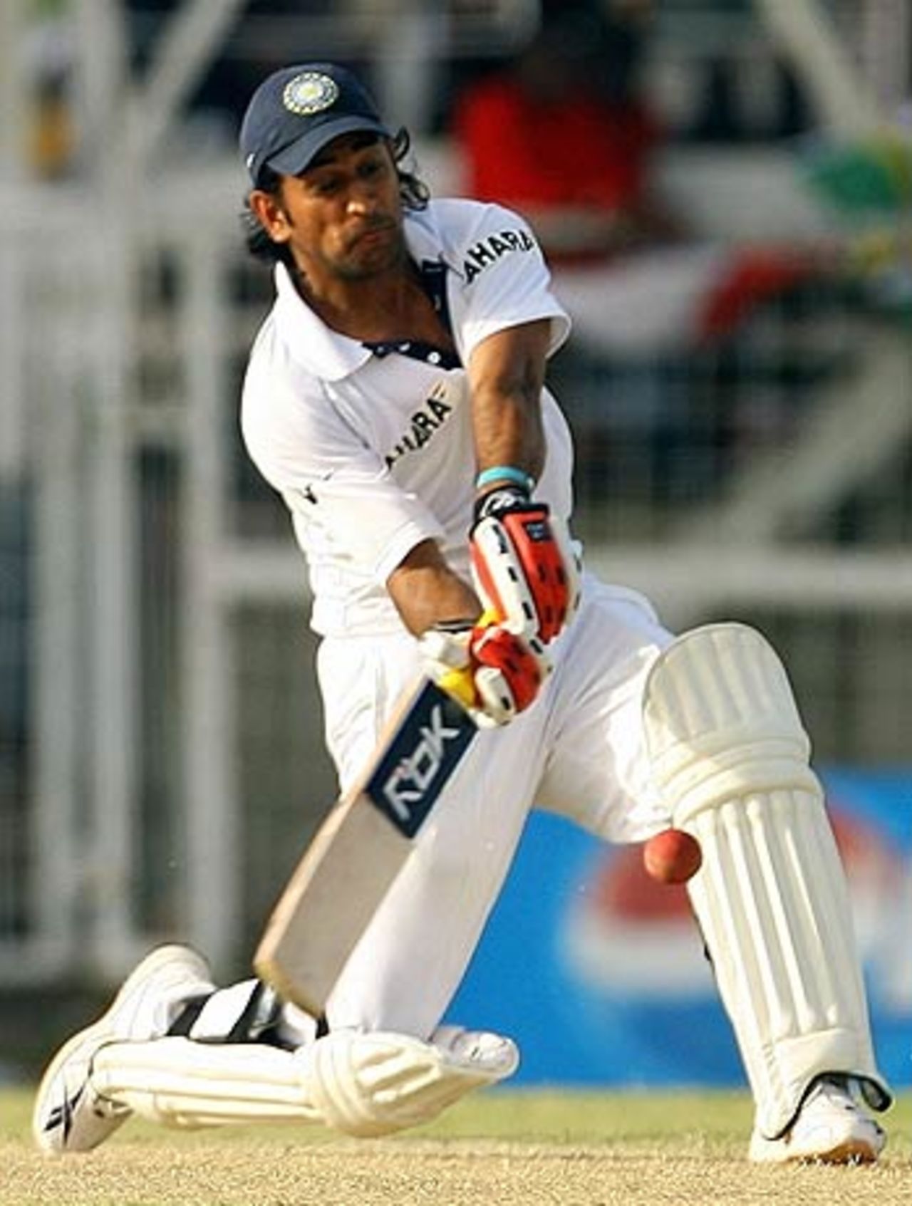 Mahendra Singh Dhoni hoicks a huge six off Dave Mohammed, West Indies v India, 1st Test, Antigua, 4th day, June 5, 2006