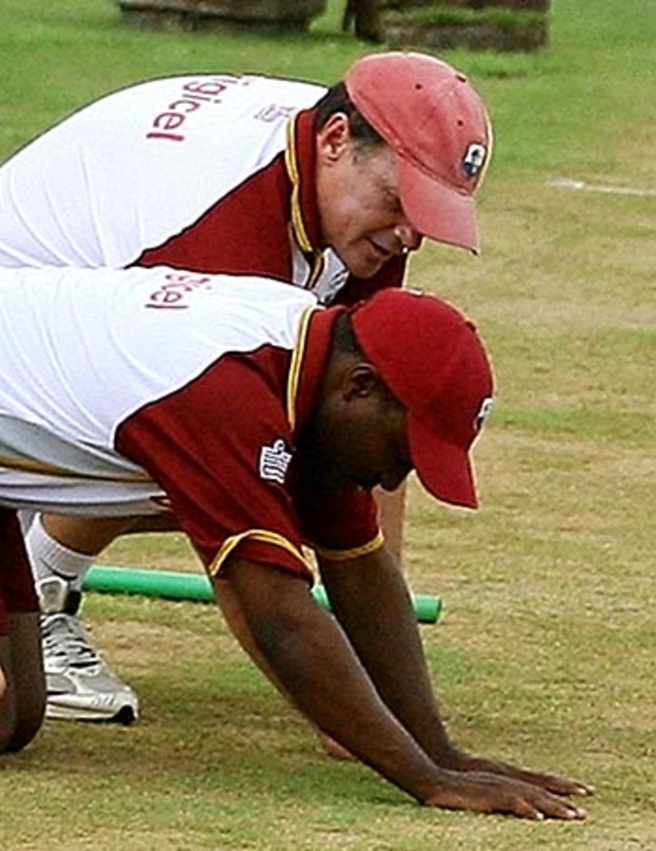 Brian Lara and Bennett King take a close look at the pitch, St Lucia, June 9, 2006