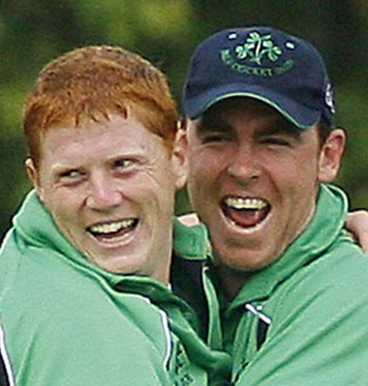 Kevin O'Brien and Trent Johnston celebrate dismissing Andrew Strauss, Ireland v England, Stormont, June 13, 2006