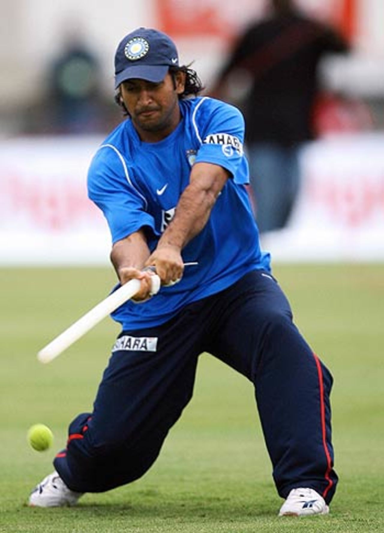 Mahendra Singh Dhoni swings and misses - with a stump, West Indies v India, 2nd Test, St Lucia, 4th day, June 13, 2006