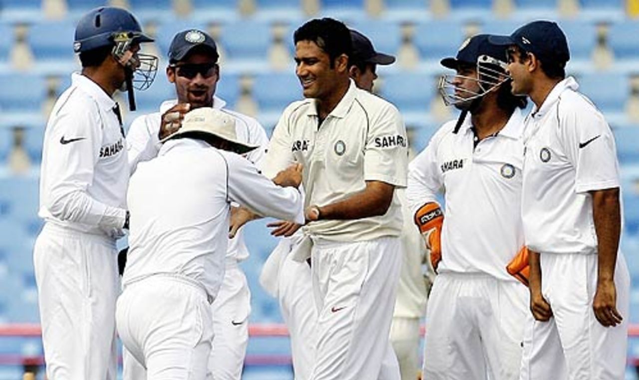Anil Kumble is congratulated by his team-mates after getting the first breakthrough of the morning, West Indies v India, 2nd Test, St Lucia, 5th day, June 14, 2006