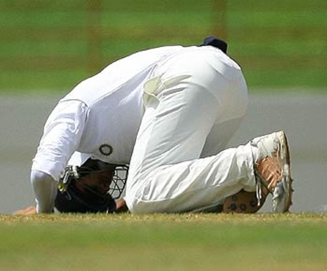 Yuvraj Singh reacts after receiving a painful blow at short leg,  West Indies v India, 2nd Test, St Lucia, 5th day, June 14, 2006