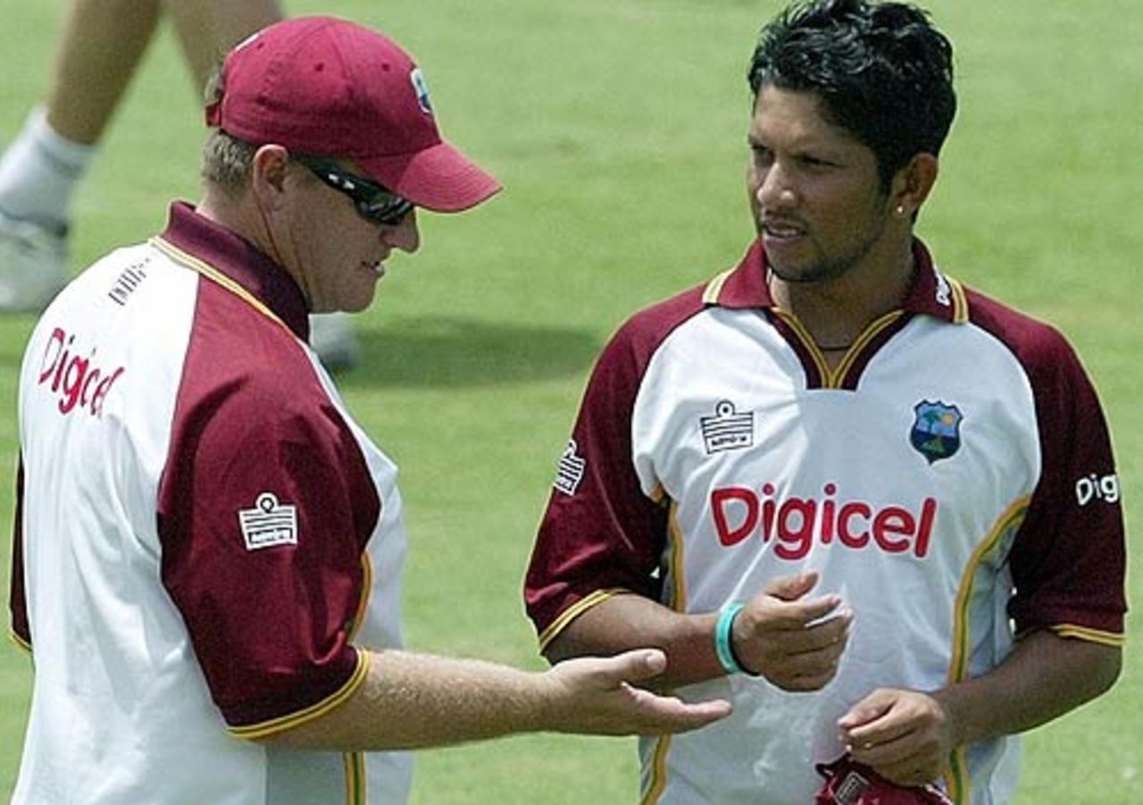 'Let me check that out' - Bennet King talks to Ramnaresh Sarwan during training, St Kitts, June 21, 2006