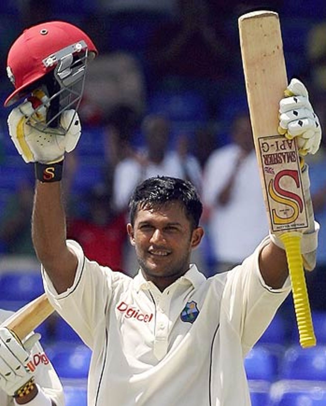 Daren Ganga celebrates his hundred in St Kitts