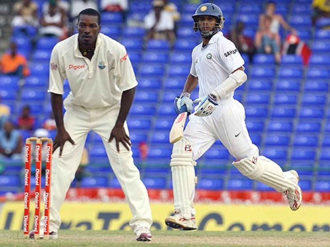 Chris Gayle waits for the throw as Rahul Dravid completes a run, West Indies v India, 3rd Test, St Kitts, 3rd day, June 24, 2006
