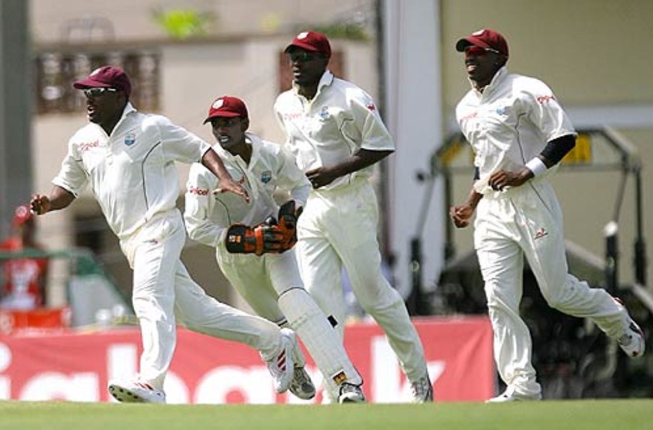 The West Indians rush to mob Jerome Taylor, West Indies v India, 3rd Test, St Kitts, 4th day, June 25, 2006