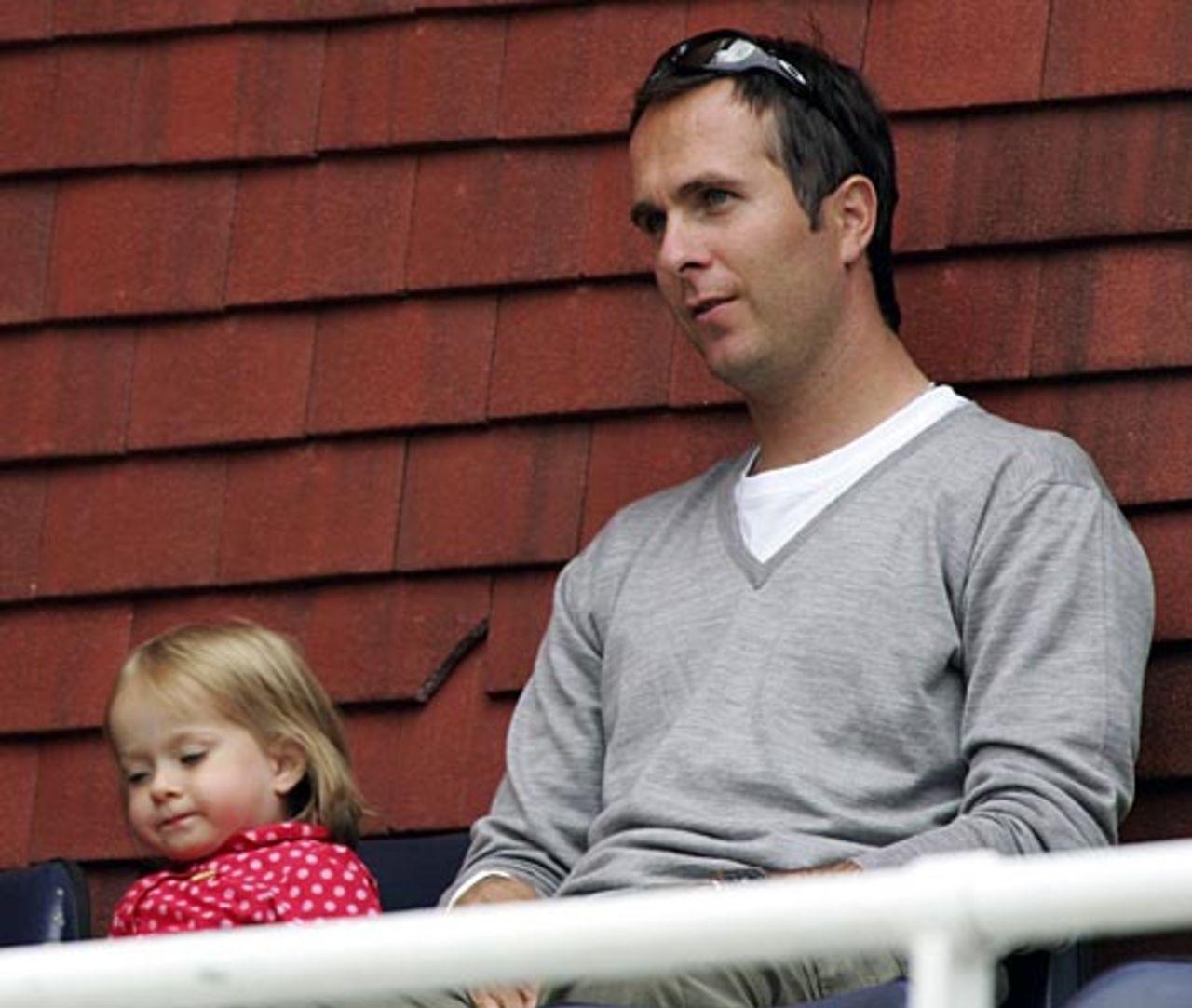 Michael Vaughan watches from the stand with his daughter Talulah Grace, Yorkshire v Durham, Headingley, June 27, 2006