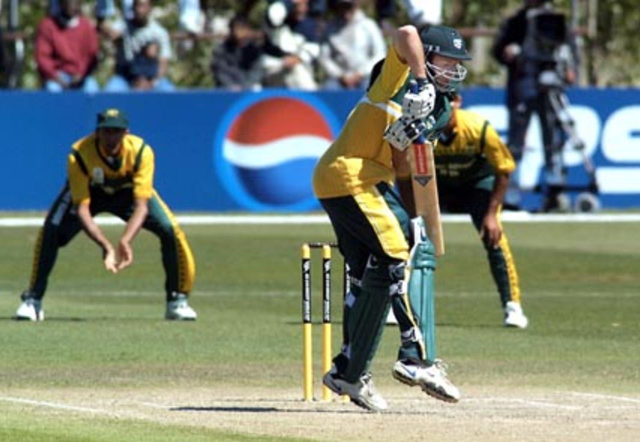 Australia Under-19 batsman Craig Simmons awkwardly plays a short delivery from South Africa Under-19 bowler Ryan McLaren during his innings of 34. ICC Under-19 World Cup Super League Final: Australia Under-19s v South Africa Under-19s at Bert Sutcliffe Oval, Lincoln, 9 February 2002.