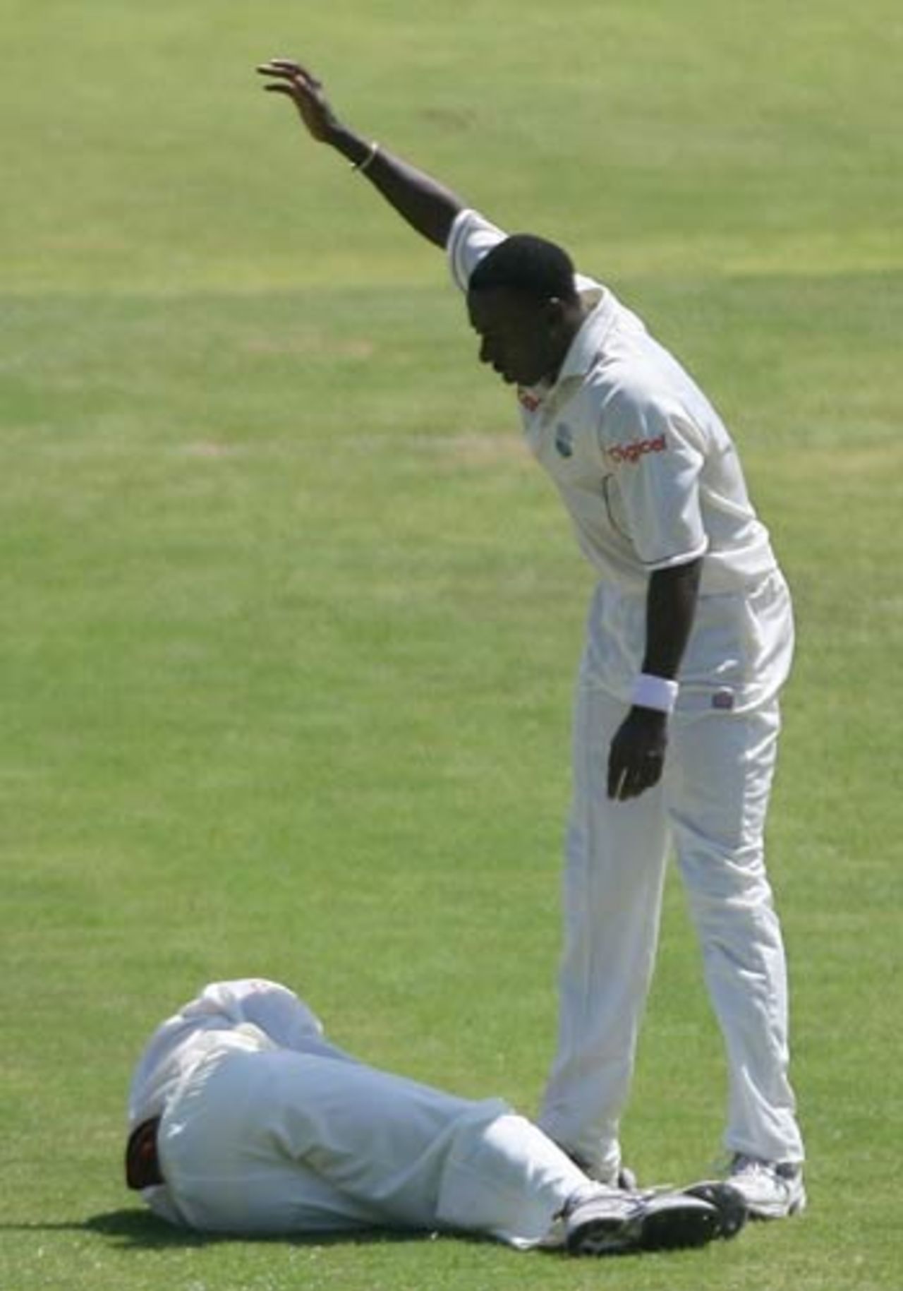 Pedro Collins calls for help after Ramnaresh Sarwan is felled, West Indies v India, 4th Test, Jamaica, 1st day, June 30, 2006
