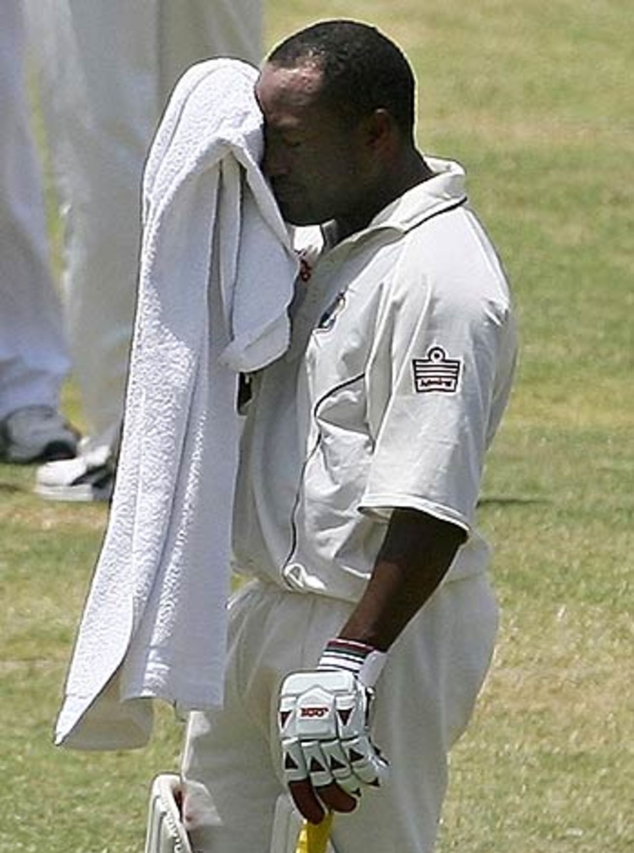 Brian Lara takes a breather during a tense run-chase, West Indies v India, 4th Test, Jamaica, 3rd day, July 2, 2006