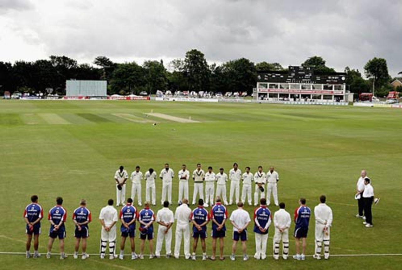 England A and the Pakistanis line up for a two-minutes silence on the anniversary of the July 7 bombings in London, England A v Pakistanis, Canterbury, June 7, 2006