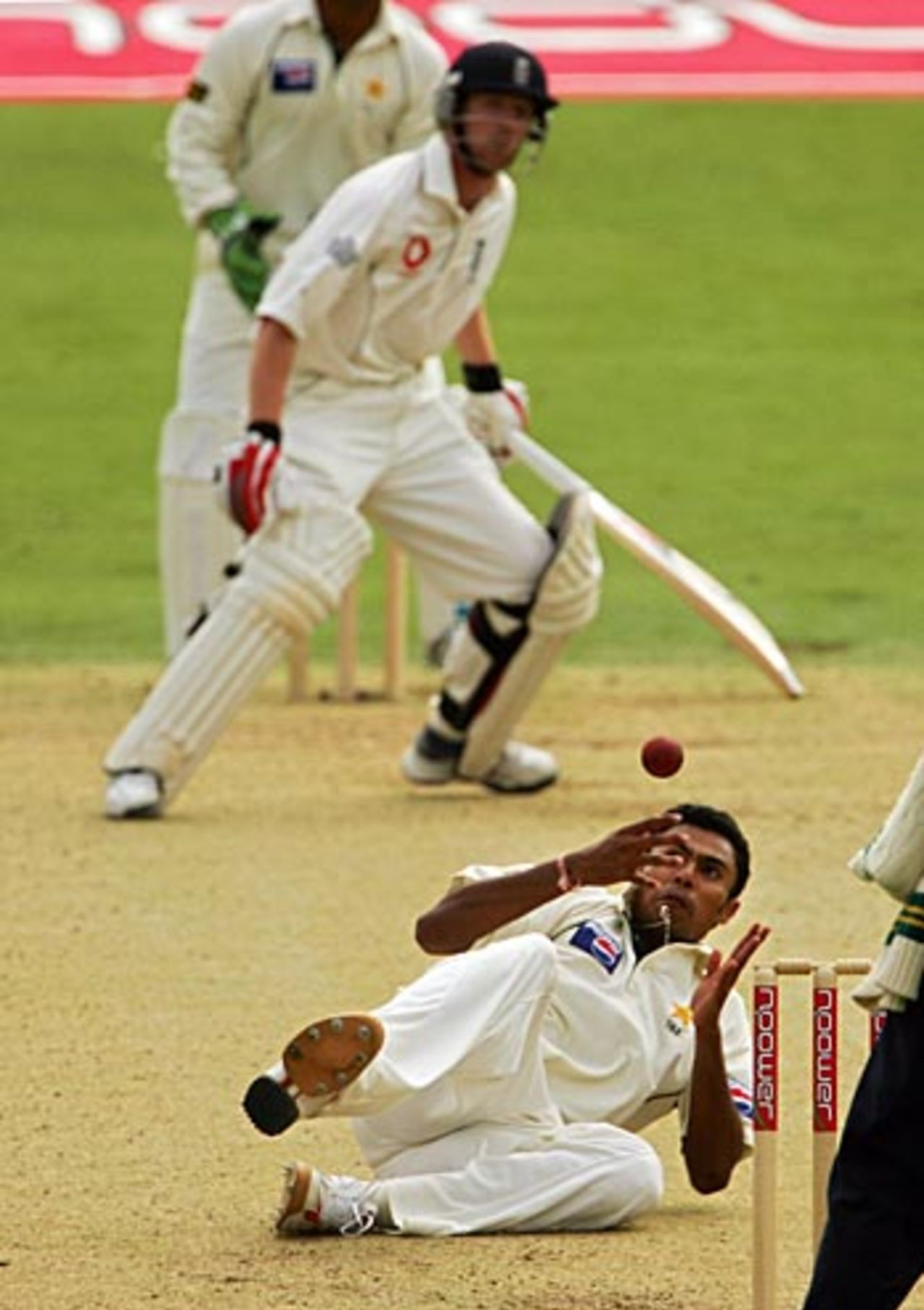 Danish Kaneria fails to grab onto a caught-and-bowled chance off Paul Collingwood, England v Pakistan, 1st Test, Lord's, July 13, 2006 
