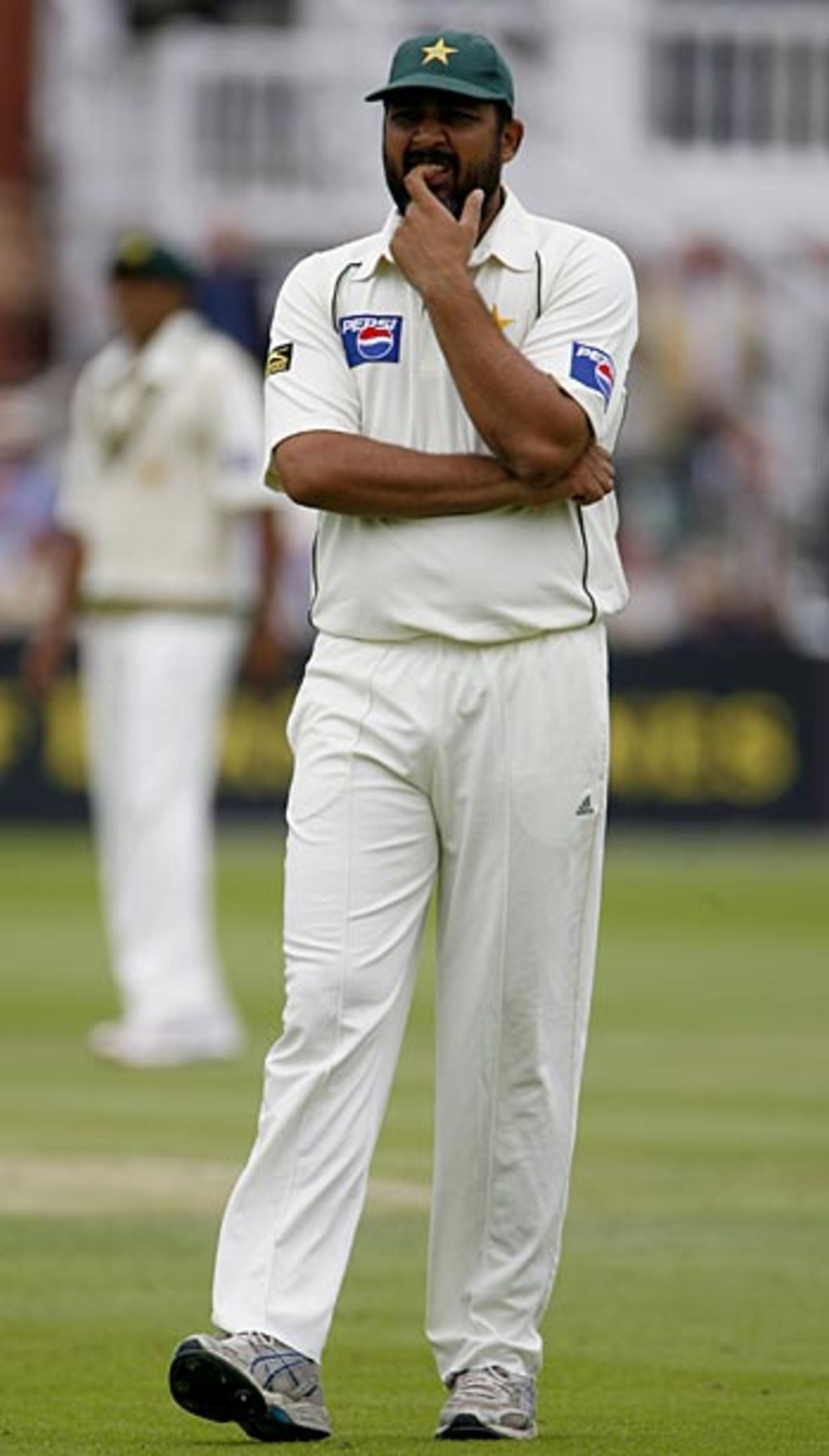 The Pakistan captain Inzamam-ul-Haq is left scratching his chin after a day of missed opportunities, England v Pakistan, 1st Test, Lord's, July 13, 2006 
